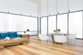 Blue and white dining room and living room corner