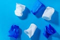 Blue and white disposable plastic cups on a blue background. the concept of abandoning plastic. the use of plastic. top view flat Royalty Free Stock Photo