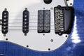 Blue White Electric Guitar. Electric guitar close-up with selective focus. A Part Of Electric Guitar Royalty Free Stock Photo