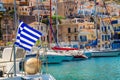 Blue white Greek flag on wind in Greece port, Kos Royalty Free Stock Photo