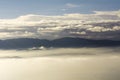 Mountains like islands on an ocean of clouds and fog Royalty Free Stock Photo