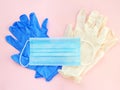 Blue and white medical gloves and disposable medical 3 ply face mask Royalty Free Stock Photo