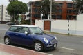 Blue and white Mini Cooper parked in Miraflores, Lima