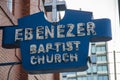 the blue and white neon sign over the red brick Ebenezer Baptist Church in Atlanta Georgia Royalty Free Stock Photo