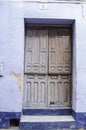 Blue and White Old Door of a House in a Village in Spain Royalty Free Stock Photo