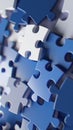 Blue and white puzzle pieces scattered in abstract background Royalty Free Stock Photo