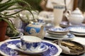 Blue and white set of old and dusty teapot and cup Royalty Free Stock Photo