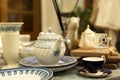 Blue and white set of old and dusty teapot and cup Royalty Free Stock Photo