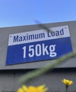 Maximum load 50 kg sign with flower front.