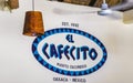 Blue white sign restaurant name El Cafecito Puerto Escondido Mexico