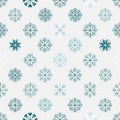 Blue and white snowflakes are arranged in a regular, repeating pa Royalty Free Stock Photo