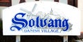 Blue and white Solvang Danish Village sign
