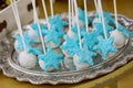 Blue and white star candy on sticks, marine thematic candy bar