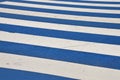 Blue and white striped cross road on a treet in Amsterdam