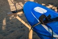 Blue and white surfboard lying on a board rack ready for surfing. close up.Bali.Indonesia. Surf boards on sandy beach for rent. Royalty Free Stock Photo