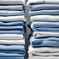 Blue and white T-shirts lie in a stack Royalty Free Stock Photo