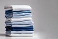 Blue and white T-shirts lie in a stack Royalty Free Stock Photo