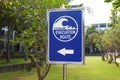 A Blue and White Tsunami Evacuation Route Sign at a hotel in Kuta, Bali, Indonesia