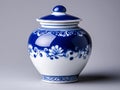 A blue and white vase sitting on top of a table Royalty Free Stock Photo