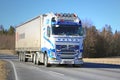 Blue and White Volvo FH Semi Truck Transport at Spring