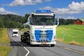 Blue White Volvo Milk Tanker on Road Royalty Free Stock Photo