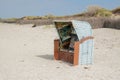 Blue Wicker Beach Chair on Island DÃÂ¼ne, Helgoland Royalty Free Stock Photo