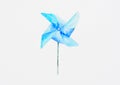 Blue wind turbine on white background