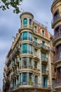 Blue window corner house in Barcelona, Spain