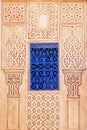 Blue window at a wall with Arabic ornaments Royalty Free Stock Photo