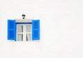 Blue window on the white wall Royalty Free Stock Photo