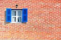 Blue windows on brick wall Royalty Free Stock Photo