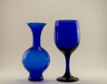 Blue wine glass on blue vase Royalty Free Stock Photo