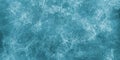 Blue winter background frost ice elements or frozen water aqua texture with cold colors and white textured frosty grunge pattern Royalty Free Stock Photo