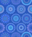 Blue winter background with intricate colorful snowflakes. Print for fabric, wallpaper, wrapping design