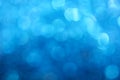 Blue winter bokeh lights abstract background