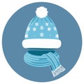 Blue winter hat with snowflake pattern and striped scarf on a circular background symbolising cold season vector Royalty Free Stock Photo