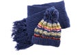 Blue winter knit hat and scarf isolated on white background Royalty Free Stock Photo