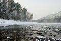 Blue winter mountain misty river. Snow frozen pine trees Idyllic landscape. Winter mountains natural view, sky, forest . Travel Royalty Free Stock Photo