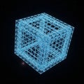 Blue wireframe hypercube tesseract floats against a starry black Royalty Free Stock Photo