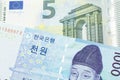 A blue won note from South Korea with a euro note from the European Union eurozone