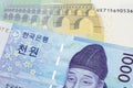 A blue won note from South Korea with a euro note from the European Union eurozone