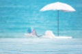 blue wood table top on blur beach umbrella on the sea background Royalty Free Stock Photo