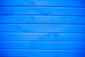 Blue wooden background. Blue painted wooden texture, background and wallpaper. Horizontal composition. Royalty Free Stock Photo