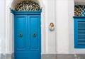 Blue wooden doors of historical house in Malta