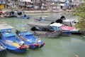 Blue wooden fishing boats in sheltered dock, amoy city