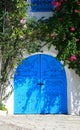 Blue wooden garage gate in tunisian arabic style