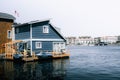 Blue wooden house on the water at Fishermans wharf