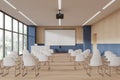 Blue and wooden lecture hall interior with projection screen Royalty Free Stock Photo