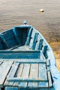 Blue wooden rowing boat. Royalty Free Stock Photo