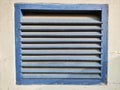 Blue wooden shutter detail with vertical panel Royalty Free Stock Photo